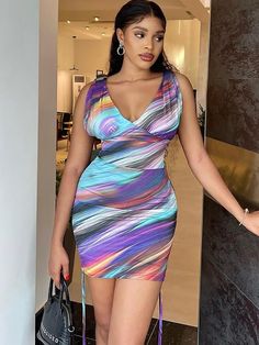 Material: Made of 90-95% Polyester & spandex.Feature: Sleeveless. abstract print. tie dye. v-neck. tie up. ruched. bodycon. mini dress.Style: Casual. Clubwear Multicolor V-neck Bodycon Dress, Multicolor V-neck Bodycon Dress For Night Out, Summer Multicolor Ruched Bodycon Dress, Fitted Sleeveless Tie Dye Mini Dress, Multicolor Ruched V-neck Mini Dress, Tie Dye Fitted V-neck Dress, Fitted Tie Dye V-neck Dress, Tie-dye Fitted V-neck Dress, Casual Clubwear