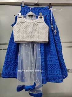 Product: Custom made girls kids dress. Fabric: Lehenga- Soft thread work net Top - embroidery silk Dupatta - embroidered net Delivery Time : Please let me Know if you are ordering for any special dates kindly inform me for any dates or times frame you keeping in mind. Festive Lace Work Lehenga For Navratri, Traditional Drape Sets With Lace Work For Navratri, Navratri Traditional Drape Sets With Lace Work, Blue Choli With Chikankari Embroidery For Diwali, Blue Lehenga With Chikankari Embroidery For Festivals, Blue Chikankari Embroidered Lehenga For Festivals, Navratri Anarkali Choli With Lace Work, Festival Saree Sets With Lace Work, Festive Sets With Lace Work For Festivals