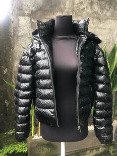 WINTER COLLECTION 2020/2021 Snakeskin DUCK DOWN Jacket for women. A jacket made from genuine python leather. Removable hood. Outside: GENUINE PYTHON LEATHER Inside: DUCK DOWN 100% Accessories: silver color (please see the photo). Lining: MONCLER All our products are 100% handmade, we always try to create interesting ideas to make your style unique. We use only the highest quality materials and accessories from around the world and only best leather from Indonesia. Before listing each new model u Luxury Black Puffer Jacket With Zipper Closure, Luxury Hooded Puffer Jacket With Zipper Closure, Luxury Puffer Jacket For Outdoor Fall Use, Luxury Puffer Jacket For Fall Outdoor, Luxury Hooded Puffer Jacket For Streetwear, Luxury Black Hooded Puffer Jacket, Luxury Puffer Jacket With Double-lined Hood, Luxury Zipper Closure Outerwear For Outdoor, Luxury Outdoor Outerwear With Zipper Closure