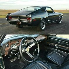 an old mustang sitting on the side of the road next to a car with its door open