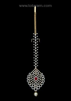 18 karat gold "detachable" diamond maang tikka cum pendant - papidi billa with color stones & south sea pearls
  this product can be used as pendant.
  this product has inter changeable stones in the pendant.
  gross weight of the pendant without chain : 10.400 grams
  gross weight of the diamond tikka chain without pendant : 4.850 grams
  length of the pendant : 2.30 inches
  width of the pendant :  1.30 inches
 - 235-GT493 - in 15.250 Grams for USD $3,561.91 USD. 
Made in India by Totaram Jewe Elegant Yellow Gold Tikka For Diwali, Traditional Bridal Necklace With Diamond Accents For Festive Season, Yellow Gold Diamond Jewelry With Stone Work, Traditional Yellow Gold Bridal Necklace With Diamond Accents, Traditional Kundan Necklace With Single Cut Diamonds For Reception, 22k Gold Jewelry With Diamond Accents For Wedding, Ceremonial Diamond Jewelry For Diwali, 22k Gold Wedding Jewelry With Diamond Accents, Gold Kundan Jewelry With Diamond Accents