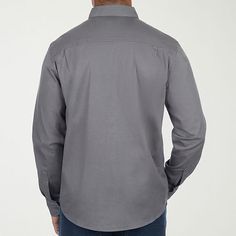 Made from cotton-twill, this American Outdoorsman men's long-sleeve button-down shirt is both functional and stylish. It features a regular-fit, a collar neck, and chest button pockets. Wear it with jeans and boots. 2nd Piece Sleeve Length: Long SleevesClosure Type: ButtonFit: Regular FitNeckline: Collar NeckPockets: 2 Chest Button PocketsSleeve Length: Long SleeveApparel Length: 28 InchesFiber Content: 98% Cotton, 2% SpandexFabric Description: TwillLining Material: CottonCollar: Button Down Co… Solid Color Collared Shirt With Functional Buttons, Business Casual Cotton Shirt With Snap Buttons, Gray Button-up Shirt For Work, Casual Shirt With Spread Collar And Back Button Closure, Gray Cotton Shirt For Business Casual, Gray Tops With Button Closure For Business Casual, Gray Cotton Tops For Business Casual, Gray Cotton Top For Business Casual, Cotton Tops With Functional Buttons For Work