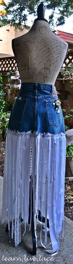 Wranglers and Lace Denim Jeans Skirt, Unique One of A Kind Festival Lace Skirt  This skirt is made from men’s cut off blue denim jeans size 35. I have added vintage lace, bias tape, ribbon, buttons, rick-rack, beads, pearls, silk flowers, tiny crystals. The back pocket has a full bouquet of ceramic flowers sewn on one and tiny pearl chain on the other. I have collected it all from various places. Mostly the local thrift store that gives all sales back to the community! Each of the pieces is s... Festival Dark Wash Denim Bottoms, Bohemian Cutoff Bottoms With Frayed Hem, Diy Denim Skirt, Full Bouquet, Clothing Upcycle, Skirt Jeans, Diy Skirt, Recycled Jeans, Denim Jean Skirt