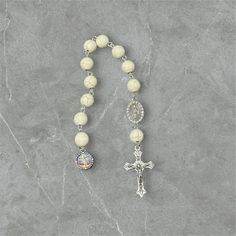 Embrace the serenity of prayer wherever you go with our exquisite Single Decade Pocket Rosary. Meticulously handcrafted with care and devotion. 🌟 Features: - Authentic craftsmanship: Handmade with love and precision. - Compact design: Fits snugly into your pocket, purse, or backpack for easy carrying. - Quality materials: Crafted using high-quality beads. - Elegant aesthetics: Delicately designed to inspire peace and tranquility during prayer. 🙏 Purpose: Designed for those seeking solace in th Adjustable Spiritual Rosary With Spacer Beads, Spiritual Rosary With 8mm Beads For Blessing, Adjustable Beaded Rosary For Blessing, Spiritual Beaded Rosary For Blessing, Spiritual Beaded Rosary As Gift, White Rosary With 8mm Beads For Meditation, White Rosary With Round Beads For Meditation, White 8mm Beads Rosary For Meditation, White Rosary With Wooden Beads As Gift