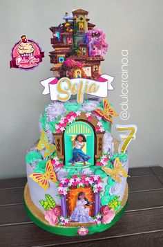 a colorful cake with an image of the princess on it