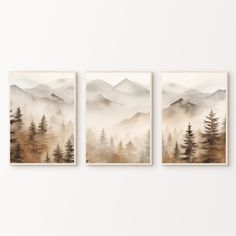 three paintings with trees and mountains in the background, hanging on a wall next to each other