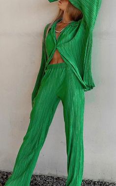 Description- -High Waisted Pant -Elastic Waistband -Pleated -Slight Flare -Part of a matching set// sold separately Size Chart Small Medium Large Bust 34 36 38 Waist 26 28 30 High Hip 34 36 38 Low Hip 37 39 41 **in inches** Trend Alert: Our new keeping it green set is giving cool girl vibes. We love the high waisted pleated pants with a small kick flare. This elevated set is modern, and effortless. You can dress this style up or down. We love this paired together with the keeping it green button Aliexpress Outfits, Celana Fashion, Wide Leg Pant Suit, Oversized Outfit, Solid Color Pants, Traje Casual, Stylish Clothes For Women, Casual Suit, Shirt And Pants