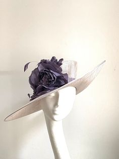 Lilac wide brim hat  This amazing lilac wide brim hat is made from sinamay fabric. On the side is sitting matching dark lilac colour flower and feathers. Lilac hat will be an amazing accessory to compliment your outfit. It will fit the average head size around 57 cm. You can wear this amazing hat at the wedding, Christening, Royal Ascot races, and any other special occasion. Enjoy! xx Luxury Purple Mini Hat For Royal Ascot, Lilac Hat, Royal Ascot Races, Mother Of The Bride Hats, Sinamay Fabric, Ascot Races, Lilac Colour, Royal Ascot Hats, Ladies Hats