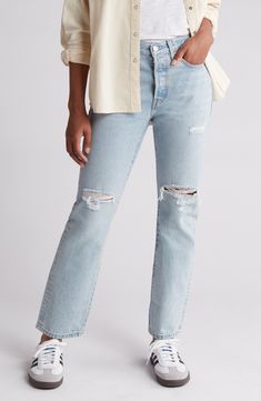 Made from faded nonstretch denim, these iconic 501 jeans feature a high waist, full-length straight legs and ripped knees for effortlessly cool style. Button fly Five-pocket style 100% cotton Machine wash, tumble dry Imported 501 Jeans, Levi's 501, Straight Leg Jeans, Leg Jeans, Levi's, Cool Style, Denim Jeans, Full Length, High Waist