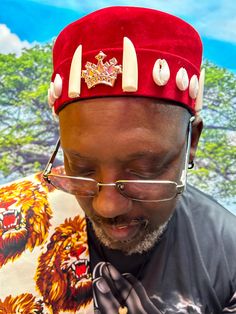 Igbo Chieftain African velvet hat.  Used for weddings and African formal occasions.  Red hat made in Nigeria with embellishments. Size 23" head circumference, Not one size fits all!  Measure the crown of your head for the correct fit! Hat is ready to be shipped. Kufi Hat, Mens Hat, Velvet Hat, Top Hats, Red Hat, Red Hats, Head Circumference, Hat Making, Top Hat