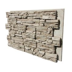 a stone wall mounted on the side of a building