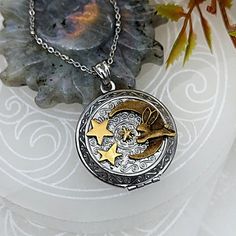 "This fillable lightweight Bunny keepsake locket necklace can secure any sentimental item that will fit in the disc. This is made of lightweight matte finish steel. A double sided locket with the bronze color bunny & brass stars on one side, and single brass Crescent moon on the back. *Placement of the stars may vary* Measurements: It is a medium sized \"light weight\" locket. Please see listing photos Materials: Light weight matte Steel locket Brass Acrylic fillable disc Includes: 1 Locket Celestial Locket Necklace For Gifts, Celestial Locket Necklaces For Gifts, Celestial Style Locket Jewelry Gift, Bunny Hair, Cremation Necklaces, Urn Jewelry, Urn Necklaces, Cremation Jewelry, Moon Stars