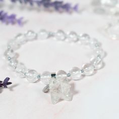 This crystal bracelet is made of natural Clear Quartz and has a beautiful Merkaba charm. Our Crystal Bracelets are designed to feel lightweight, comfortable, and effortless.Stringing each crystal beads is part of our mindful Intention when we create this bracelet, infusing positive energies, love, and happiness within each design.By combining meaningful symbols and natural crystals, we give this accessory relevance in every way. Clear Quartz | Clarity, Awareness & HealingClear Quartz is a st Spiritual Crystal Bracelets As Gift, Spiritual Mineral Crystal Bracelet Gift, Spiritual Hypoallergenic Crystal Bracelet Gift, Hypoallergenic Crystal Bracelet For Spiritual Gift, Spiritual Crystal Beaded Bracelets, Spiritual Crystal Beaded Bracelet Gift, Spiritual Quartz Bracelets As Gifts, Spiritual Faceted Stretch Bracelet As A Gift, Spiritual Crystal Beaded Bracelet For Gift