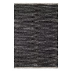 a black and white rug on a white background