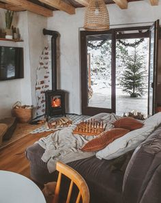 a living room filled with furniture and a fire place