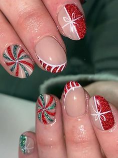 candy cane nails: Christmas gift and peppermint candy canes Christmas Nails Design Ideas, Christmas Candy Nail Art, Glitter Candy Cane Nails, Candy Cane And Gingerbread Nails, Peppermint Acrylic Nails, Crazy Christmas Nails, Sparkly Candy Cane Nails, Nutcracker Nails, Candy Came Nails Design