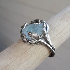 Made-to-Order Hand Sculpted Leaf & Twig Raw Uncut Rough Natural Blue Aquamarine Ring, a One-of-a-Kind Ring made to order.  Delicate hand خواتم خطوبة, Blue Aquamarine Ring, Jewelry Pakistani, Ring Sling, Bohol, Aquamarine Ring, Aquamarine Rings, Diy Schmuck, Angelina Jolie