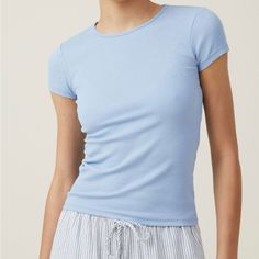 Brand New, Never Worn Blue Ribbed Tops With Relaxed Fit, Blue Ribbed Top With Relaxed Fit, Everyday Blue Ribbed Tops, Trendy Blue Ribbed T-shirt, Basic Blue Ribbed T-shirt, Blue Ribbed Crew Neck Top, Casual Blue Ribbed T-shirt, Light Blue Ribbed Stretch Top, Light Blue Stretch Ribbed Top