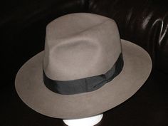 A classic center dent crown with a front pinch (the areas at the front of the hat.) Speaking of the pinch, most folks tend to grab a hat by the pinch and the crown... DON'T! It ruins the hats shape. Always handle the hat by the brim, especially if its straw as they are very delicate. The Crown, Panama Hat, Light Grey, Straw, Crown, Hats