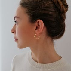 A stylish piece of jewelry for every occasion - with our golden twisted hoops you are always well dressed! Whether for the office, for a date or a relaxing weekend at home - these golden twist earrings belong in every jewelery collection.  We have set ourselves the goal of supporting young women and girls. For every piece of SANOIA jewelery purchased, we give a girl in Ghana health insurance and thus access to the health system. Find out more @sanoia_  Product details  Size: approx. 2.3 cm x 2.2 Golden Hoops Earrings, Hoops Earrings Gold, Twist Earrings, Triple Hoop Earrings, Twisted Hoop Earrings, Golden Hoops, Relaxing Weekend, Small Gold Hoops, Sunglass Chain