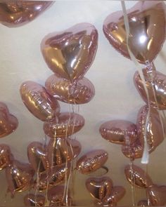 the balloons are in the shape of hearts