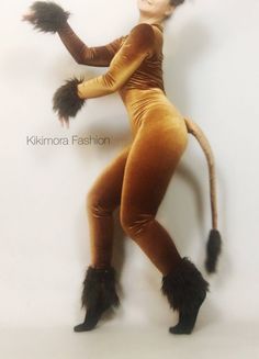 "Lion cat. Catsuit costume 😸 Outfit for Circus , dance, theater performances. Perfect for winter shows. It is cosy and soft Material - lycra Velvet ,Fur ,foam. Long sleeve with wide boat neck cut (no zipper). Brown Fur on ankles and wrist. Model on the picture wearing size Medium. Let me know if you like to purchase just Catsuit without accessoriesadd if you interested in headpiece and color go the 🦁. SIZE GUIDE XSmall: Fits women -men 85-105 lbs (and 5'4\" tall and under) Small: Fits women- m Wizard Of Oz Lion Costume, Wizard Of Oz Lion, Couture Face Mask, Costume Lion, Spandex Catsuit, Custom Leotards, Fur Outfit, Catsuit Costume, Lion Cat