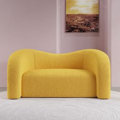 a yellow chair sitting on top of a white floor next to a painting in a room