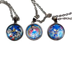 two necklaces with sonic and tails on them