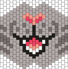 an image of a face made out of pixellated squares, with red and black eyes