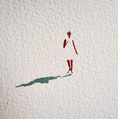 a drawing of a person walking down a street with an umbrella over their head on the wall