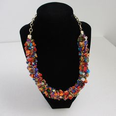 This is an amazing Statement Necklace.  Vintage Boho Style, with  vibrant colors of beads and stones. The vintage condition is very good. Adjustable 14 to 17 inches. Multicolor Round Beaded Jewelry With Stones, Multicolor Round Beaded Stone Jewelry, Vibrant Adjustable Rainbow Necklace, Vibrant Rainbow Adjustable Necklace, Adjustable Artisan Multicolor Crystal Necklace, Adjustable Multicolor Artisan Crystal Necklace, Artisan Adjustable Multicolor Crystal Necklace, Colorful Adjustable Vibrant Necklace, Multicolor Multi-stone Beads And Cabochons For Jewelry Making