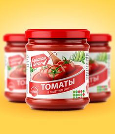 three jars of tomato sauce on a yellow background