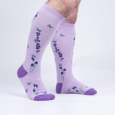 Purple knee-high socks with bees and lavender flowers are a buzzing choice for any woman's wardrobe. These knee high wonders will turn those boring legs into springtime meadows in bloom with every step you take. Try not to get honey on your shoes though. Purple Fitted Knee-high Socks, Cotton Mid-calf Socks For Spring, Mid-calf Cotton Socks For Spring, Spring Cotton Mid-calf Socks, Fitted Knee-high Socks For Spring, Fitted Knee-high Socks For Summer, Bee Socks, Bee Sock, Size 12 Women Shoes