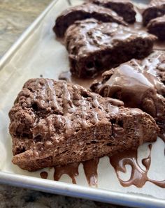 chocolate brownies and ice cream on a tray