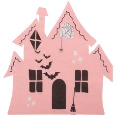 a pink house with bats and spider webs on it's roof is shown