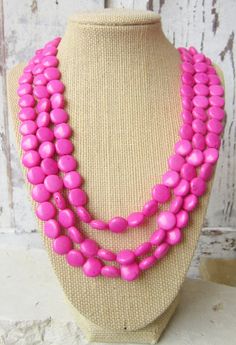 Pink Turquoise Statement Necklace. Pink Round Single Strand Jewelry, Pink Single Strand Round Jewelry, Round Pink Jewelry With Gemstone Beads, Pink Round Jewelry With Gemstone Beads, Pink Round Gemstone Beaded Jewelry, Cheap Playful Pink Necklaces, Affordable Playful Pink Necklace, Pink Round Gemstone Beads Jewelry, Unique Pink Necklace With Large Pendant