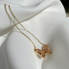 Our Rose Pink gold plated butterfly necklace is perfect to add to an outfit whether it be on a casual plain outfit or to match with a more dressed-up look.  All items are gold plated onto stainless steel. Gold Metal Butterfly Necklace, Party Butterfly Necklace With Adjustable Chain, Gold Metal Butterfly Necklace For Party, Gold Butterfly Charm Jewelry For Party, Gold Jewelry With Butterfly Charm For Party, Gold Butterfly-shaped Metal Jewelry, Gold Butterfly Metal Jewelry, Gold Butterfly Pendant Necklace For Party, Gold Butterfly Necklace With Delicate Chain For Party