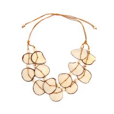 Discover the essence of understated elegance with the Iliana Necklace—a charming, adjustable short necklace featuring a delightful blend of tagua slices and dainty acai berry seeds, making it an ideal choice for retailers seeking a versatile and eco-friendly accessory that effortlessly captures customers' attention with its organic allure. Pairs well with the Amigas Earrings. Adjustable 18"-30" L Materials: Sustainable Tagua nut, Acai Berries Wax Cotton cord Organic Vegetable dyes Handmade in Ec Adjustable Cream Necklace, Adjustable White Nature-inspired Necklace, White Adjustable Nature-inspired Necklace, Adjustable Nature-inspired Necklaces With Natural Variations, Adjustable Natural Jewelry With Natural Variations, Elegant Adjustable Natural Color Necklaces, Summer Clearance Sale, Eco Friendly Accessories, Tagua Jewelry