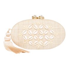 a white clutch bag with tassels on it