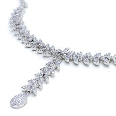 Radiant White Gold Diamond Necklace Set - the perfect addition to any sophisticated ensemble. Crafted from 18k white gold and weighing 24.1 grams, this piece features stunning round diamonds with a total weight of 2.96ct, set in a beautiful 17.5" necklace with a 1.25" drop length. It also comes with matching earrings with a length of 1.25" and screw backs for secure wearing. The lobster lock ensures this set stays safely in place, making it the perfect accessory for any occasion. PRODUCT DETAILS Silver Platinum Bridal Necklace With Single Cut Diamonds, Silver Bridal Necklace With Single Cut Diamonds In Platinum, Silver Platinum Bridal Necklace With Diamond Cut, Silver Platinum Bridal Necklace With Diamond Accents, Exquisite White Gold Hand-set Necklaces, Exquisite White Gold Hand Set Necklace, Dazzling White Platinum Necklace, Silver Diamond Necklace For Formal Occasions, Fine Silver Diamond Necklace For Formal Occasions