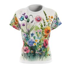 Step into a world of natural enchantment with our Watercolor Wildflower Garden T-shirt. This botanical boho masterpiece captures the essence of untamed beauty, showcasing a stunning array of delicate wildflowers dancing harmoniously on a canvas of soft fabric. .: 100% Polyester .: Light fabric (4.0 oz/yd² (113 g/m / (6.0 oz/yd² (170 g/m .: Regular fit .: Tagless .: Runs true to size .: Assembled in the USA from globally sourced parts All items are custom printed to order and that there may be sl Multicolor Bohemian T-shirt For Spring, Bohemian Multicolor Tops With Sublimation Print, Artistic Floral Print Tops For Spring, Multicolor Watercolor Print T-shirt For Spring, Multicolor Crew Neck T-shirt With Plant Print, White Digital Print Top For Spring, Bohemian Multicolor Sublimation Print T-shirt, Nature-inspired Summer Tops With Plant Print, Summer Nature-inspired Tops With Plant Print