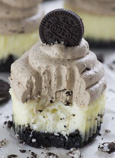 an oreo cookie cupcake with cream frosting on top