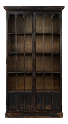 an old wooden bookcase with glass doors on the front and bottom shelves, isolated against a white background