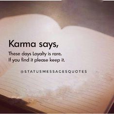 an open book sitting on top of a table next to a pen and paper with the words karma says, these days lolly is rare, if you find it please keep it