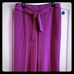 Lavender Flowy Wide Leg Pants With High Waist And Tor Belt. Flat Front, Modern Fit, Pull On, Side Slip Pockets, 96% Polyester/4% Spandex, Unlined, 32 In Inseam, Machine Wash Purple Ankle-length Wide Leg Pants, Purple Wide-leg Workwear Pants, Purple Wide-leg Pants For Work, Purple Ankle-length Work Pants, Purple Ankle Pants For Work, Chic Purple Ankle-length Bottoms, Chic Purple Ankle-length Pants, Elegant Purple Ankle-length Pants, Stretch Ankle-length Purple Pants