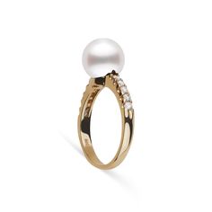 This 9.0-10. mm AAA quality White South Sea pearl ring showcases the pure organic beauty of elegant south sea pearl. The flawless pearl appears to float above the gold, yet is securely attached by a strong post. The classic-style ring features a solid 14-karat gold band that is set with 0.25 carats of diamonds. The ring setting is made in-house and is composed of solid 14 karat gold. We use an extra-fine diamond grade (VS1-G), which is normally reserved for solitaire settings. It's rare to see t Timeless White Akoya Pearl Ring, White Akoya Pearl Timeless Ring, Timeless Pearl White Pearl Ring, Timeless Akoya Pearl Drop Ring, Timeless Pearl White Ring With Pearl Drop, Formal Solitaire Pearl Ring In Yellow Gold, Formal Yellow Gold Akoya Pearl Ring, Timeless Pearl White Rings With Pearl Drop, Formal Yellow Gold Solitaire Pearl Ring