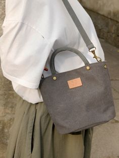 #accessories #handbag #shoulderbag #preppystyle Trendy Gray Satchel For Daily Use, Canvas Box Bag With Removable Pouch, Gray Bags With Leather Handles For Shopping, Gray Canvas Bag With Adjustable Strap For Daily Use, Trendy Gray Shoulder Bag Satchel, Large Capacity Crossbody Canvas Bag For On-the-go, Everyday Gray Canvas Bag With Adjustable Strap, Trendy Gray Shoulder Bag For On-the-go, On-the-go Canvas Satchel