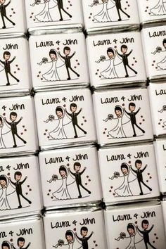 wedding candy tins are stacked on top of each other in the shape of a bride and groom