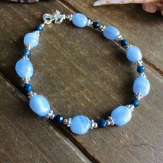 Bohemian Silver Agate Bracelet, Handmade Blue Agate Bracelets, Blue Bohemian Bracelets With Oval Beads, Bohemian Blue Agate Bracelets, Adjustable Bohemian Oval Bracelet, Adjustable Oval Bracelet With Natural Stones, Handmade Blue Bracelets With Oval Beads, Bohemian Blue Oval Bracelet, Natural Stone Beads