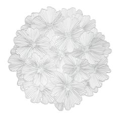 a white plate with many petals on it